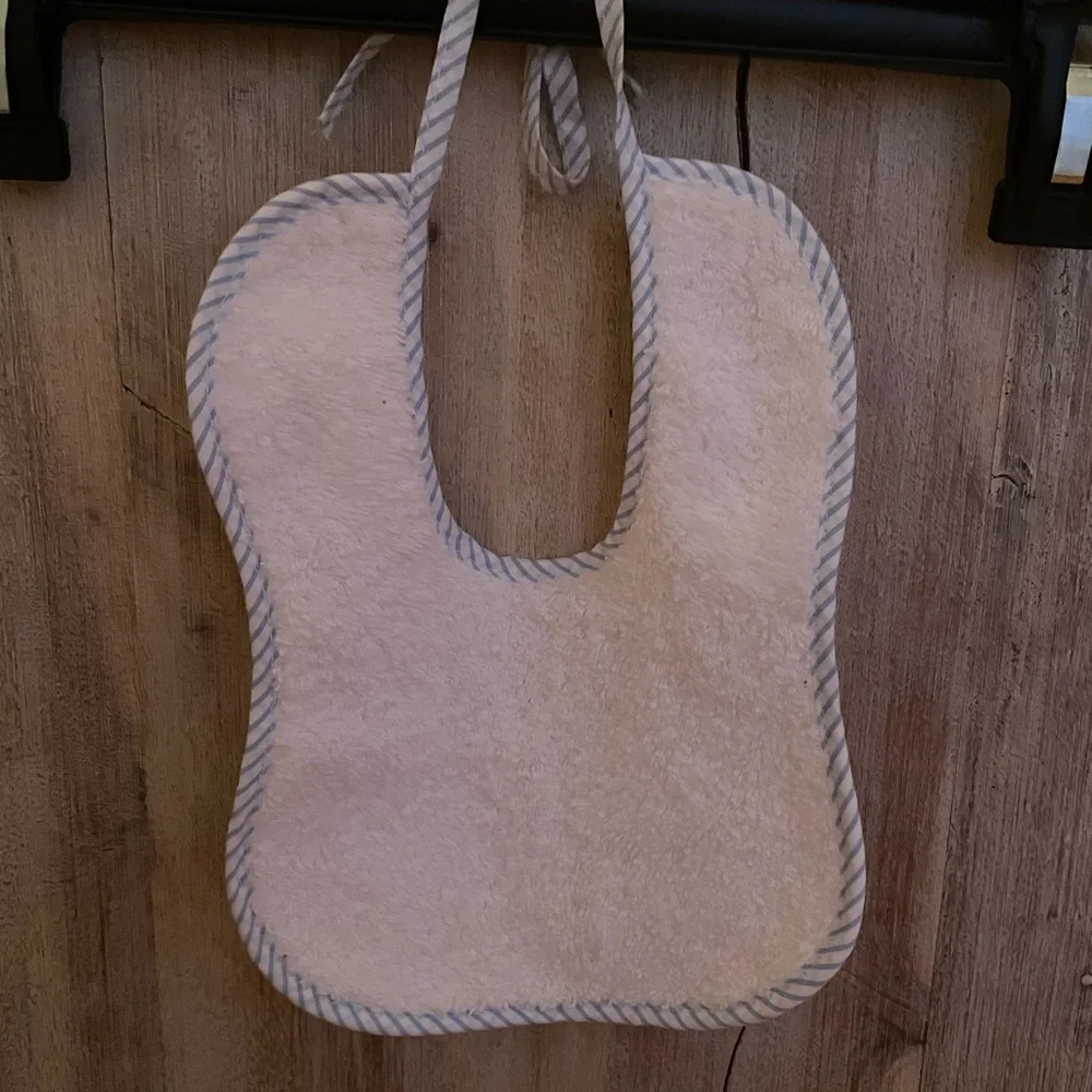 Handmade Bib white with blue trim, tie closure, brand new.